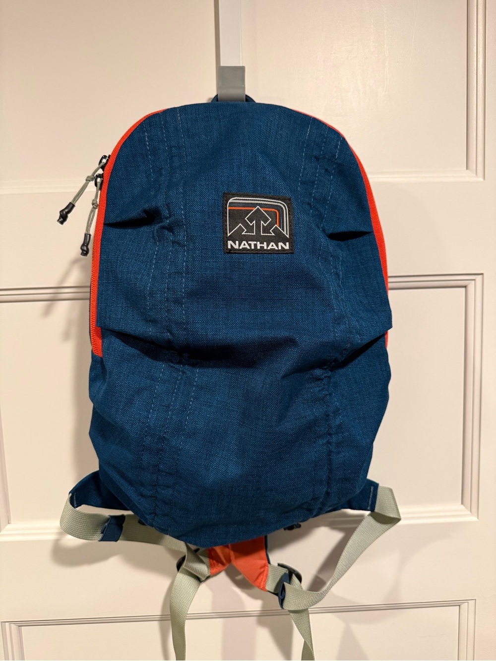 Nathan Navy and Orange Compact Outdoor Backpack